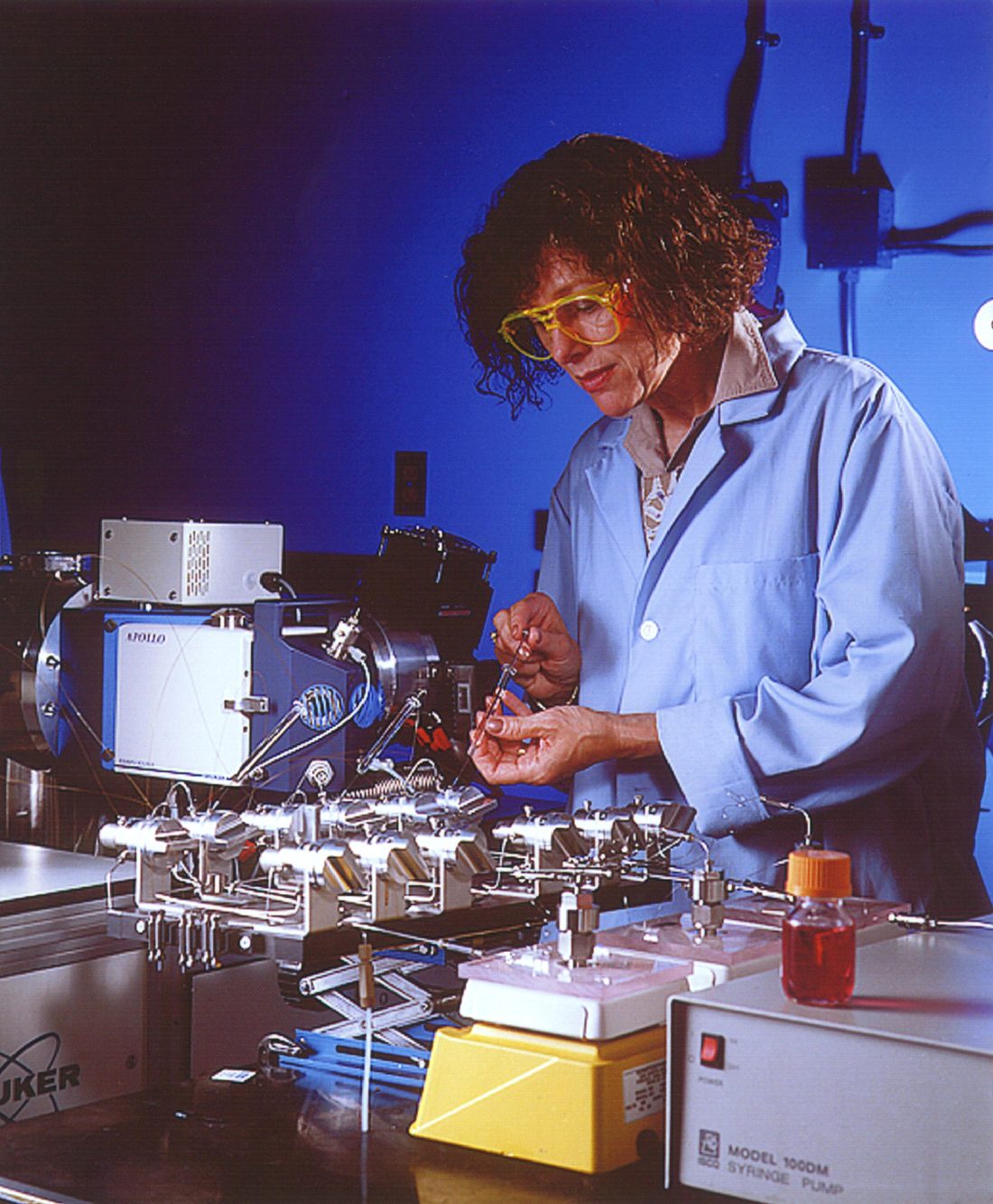 A researcher works at a large mass spectrometer used for advanced proteomics research at Pacific Northwest National Laboratory
