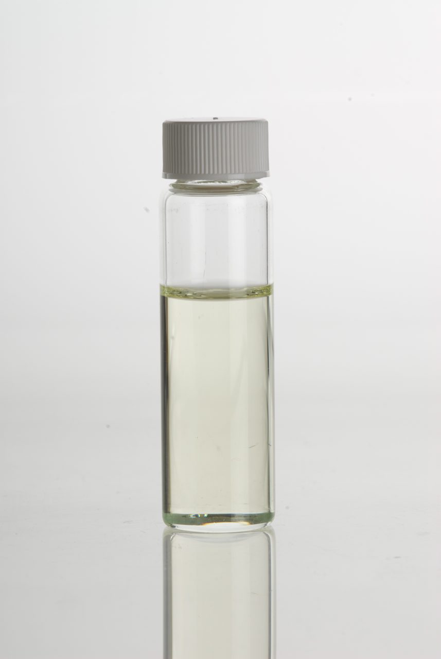 A small clear glass vial with a screw cap, filled about two thirds with pale, clear peppermint essential oil, photographed against a plain white background